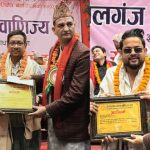 पत्रकार गिरी र अधिकारी सम्मानित